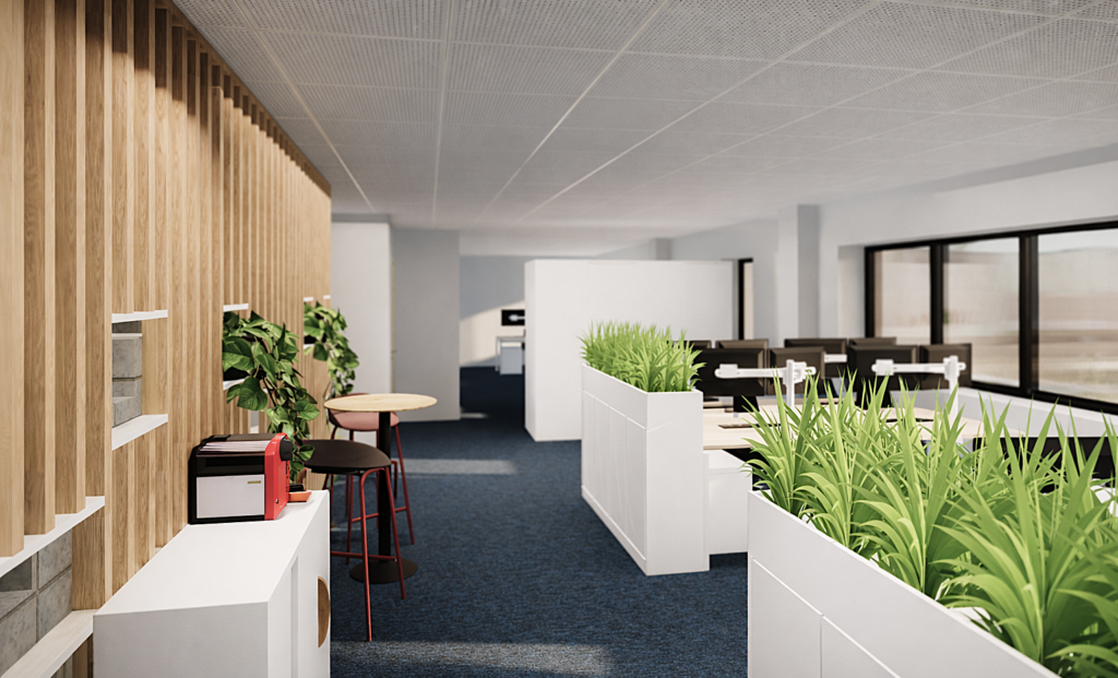 Aménagement de bureaux en open space à Bordeaux avec cuisine ouverte et cloisonnement végétal